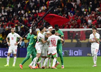 Abdoulaye Seck (C-R) of Senegal scuffles with Brahim Diaz (C) of Morocco during the CAF Africa