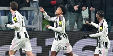 Juventus' Weston McKennie (C) celebrates after scoring a goal during the UEFA Champions League