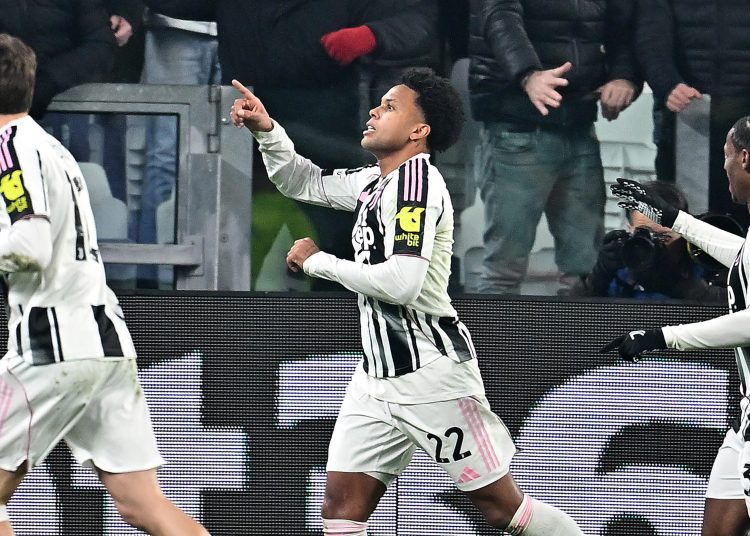 Juventus' Weston McKennie (C) celebrates after scoring a goal during the UEFA Champions League