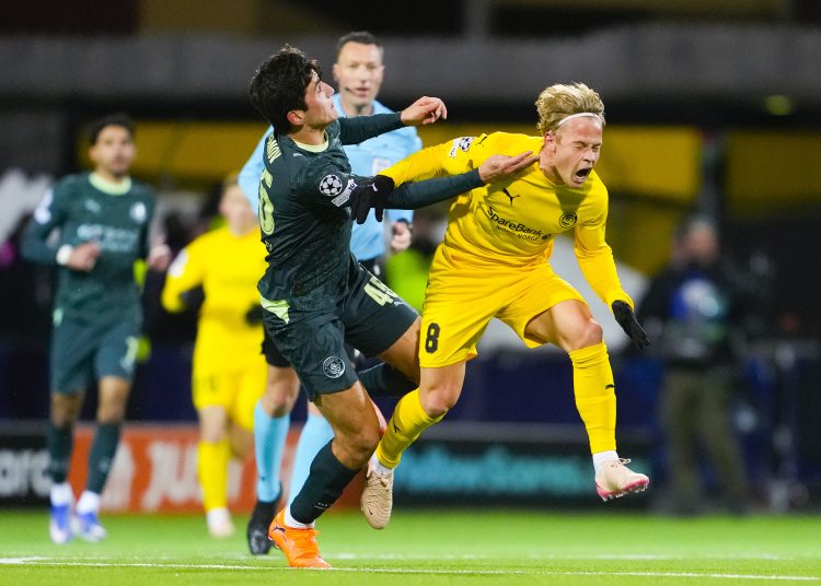 Manchester City's Abdukodir Khusanov (left) and Bodo/Glimt's Sondre Auklend during the UEFA Champions League soccer match between Bodo/Glimt
