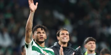 Sporting player Luis Suarez celebrates with supporters after winning the UEFA Champions League