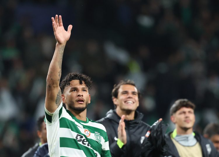 Sporting player Luis Suarez celebrates with supporters after winning the UEFA Champions League