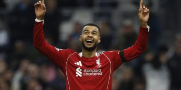 Cody Gakpo (C) of Liverpool FC celebrates after scoring the 0-3 goal during the UEFA Champions League