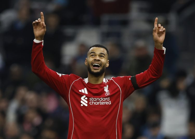 Cody Gakpo (C) of Liverpool FC celebrates after scoring the 0-3 goal during the UEFA Champions League