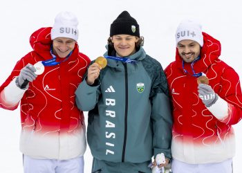 Silver medalist Marcko Odermatt of Switzerland, gold medalist Lucas Pinheiro Braathen of Brazil