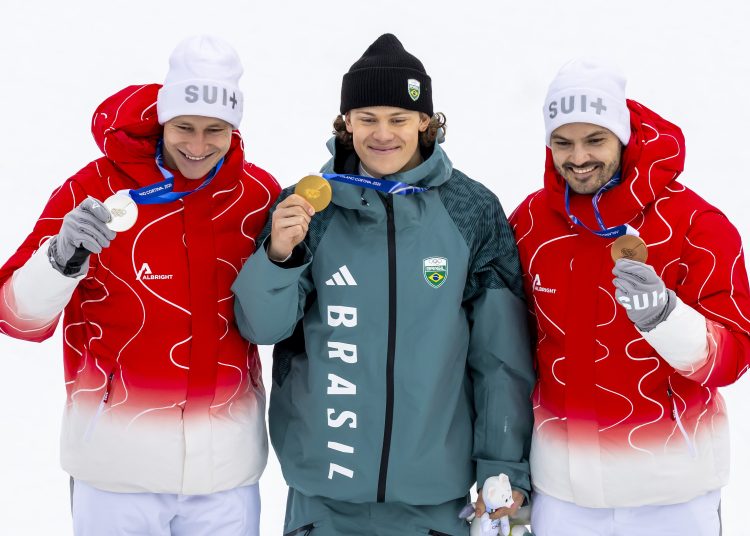 Silver medalist Marcko Odermatt of Switzerland, gold medalist Lucas Pinheiro Braathen of Brazil