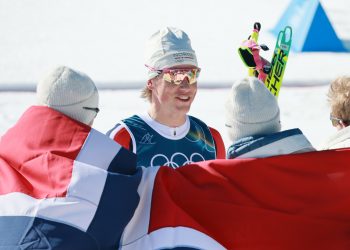 ohannes Hoesflot Klaebo (C) and team Norway celebrate winning in the Men's 4x7.5km Relay of the Cross-Country Skiing