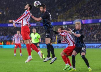 David Hancko of Atletico (L) and Brandon Mechele of Club Brugge vie for the ball during the UEFA Champions League play-offs 1st leg match between Club Brugge KV and Atletico Madrid, in Bruges