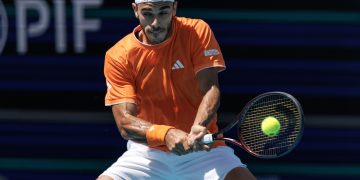 Francisco Cerundolo of Argentina in action against Daniil Medvedev of Russia during the Men's Singles