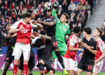 Goalkeeper Janis Blaswich of Bayer Leverkusen (C-R) makes a save during the UEFA Champions League