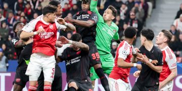 Goalkeeper Janis Blaswich of Bayer Leverkusen (C-R) makes a save during the UEFA Champions League