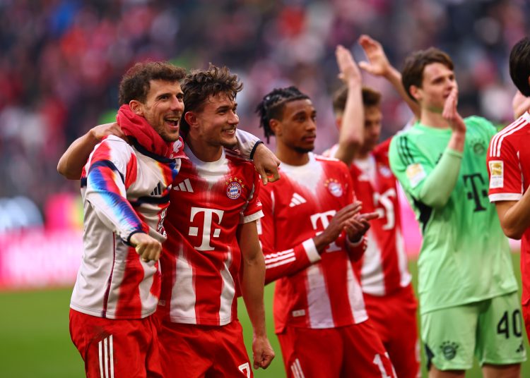Munich players applaud to supporters after winning the German Bundesliga soccer match between FC Bayern