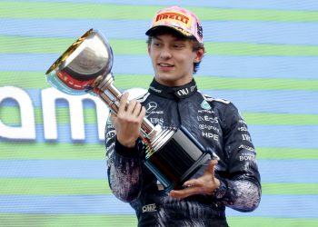 Mercedes driver Andrea Kimi Antonelli of Italy celebrates on the podium after winning the Formula 1 Japanese Grand