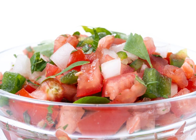 Traditional Mexican Pico de Gallo sauce isolated on white background