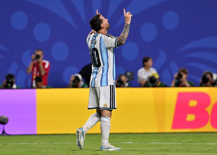 Lionel Messi of Argentina celebrates scoring the 3-0 goal during the FIFA World Cup