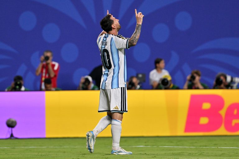 Lionel Messi of Argentina celebrates scoring the 3-0 goal during the FIFA World Cup